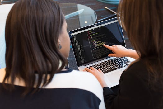 A developer reading industry news on a laptop